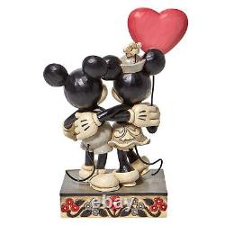 Enesco Jim Shore Disney Traditions Mickey and Minnie Mouse Heart Figurine, 7.25