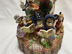 Jim Shore Disney Traditions Holiday Harmony Lighted Figurine