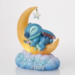Collection Enesco Disney Traditions par Jim Shore Lilo et Stitch tenant Scrump sur