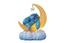 Collection Enesco Disney Traditions par Jim Shore Lilo et Stitch tenant Scrump sur