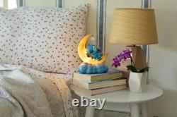 Collection Enesco Disney Traditions par Jim Shore tenant Scrump sur la lune éclairée