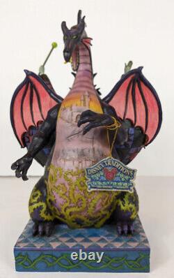 Disney Traditions Jim Shore Maleficent Dragon Casting the Spell 4011739 withBox translated in French is:

Disney Traditions Jim Shore Maléfique Dragon Lancé du Sort 4011739 avec Boîte.