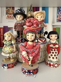 Disney Traditions Jim Shore Sonate de It's a Small World avec socle et 1ère série de 6 figurines