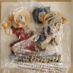 Enesco Disney Traditions Showcase Carillon Donald et Daisy Figurine en Résine
