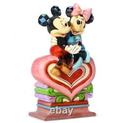 Enesco Disney Traditions par Jim Shore Mickey et Minnie Mouse assis sur un cœur
