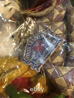 Figurine Jim Shore Disney Traditions Riant Tout le Chemin par Enesco 4005726