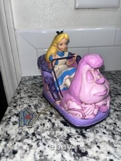 Figurine de l'attraction Alice au pays des merveilles des Traditions Disney par Jim Shore (Enesco)