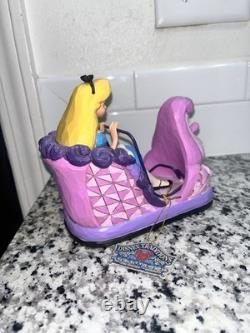Figurine de l'attraction Alice au pays des merveilles des Traditions Disney par Jim Shore (Enesco)